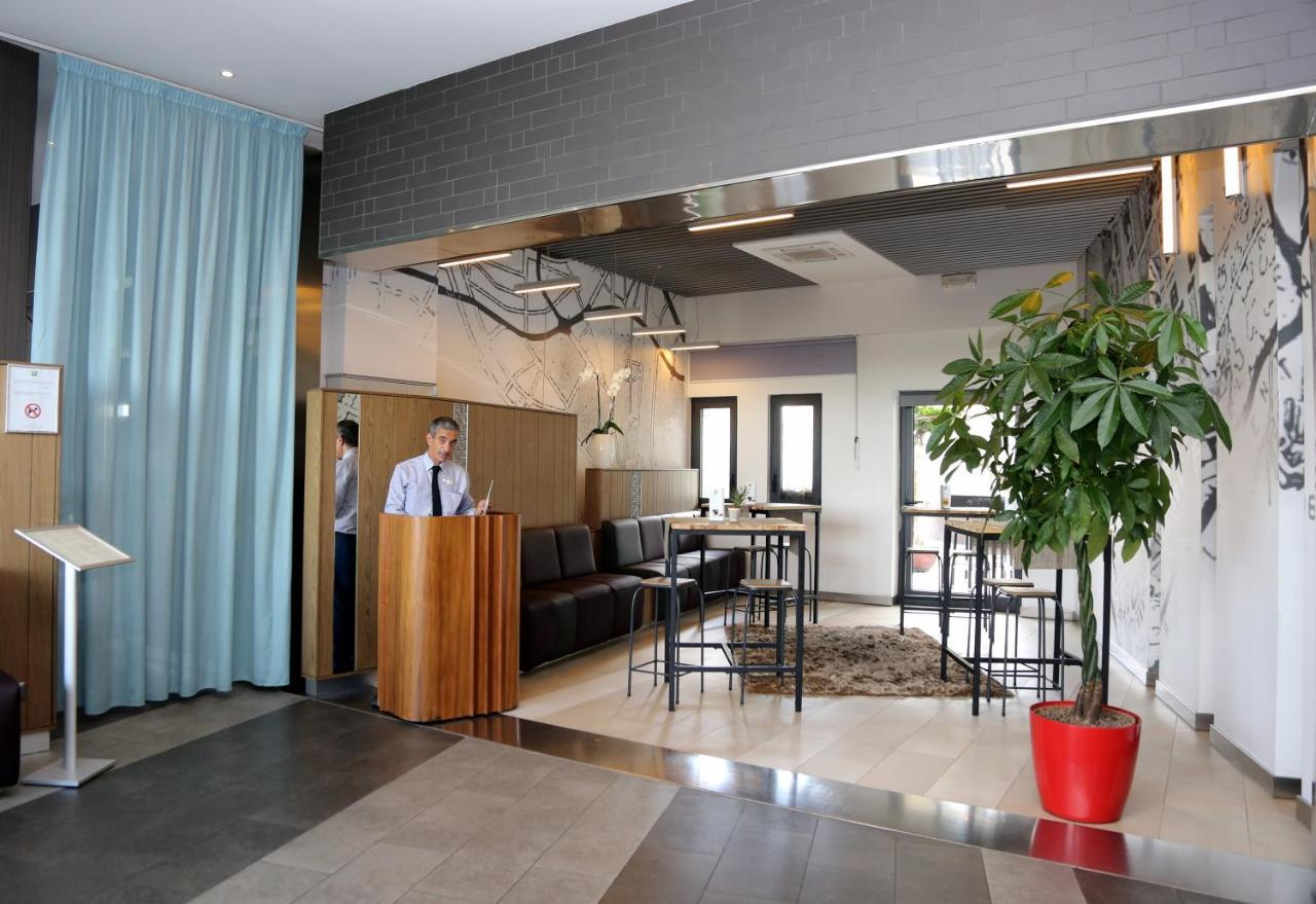 Hotel Ibis Styles Roma Eur Esterno foto